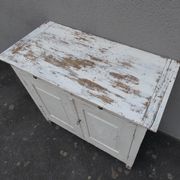 Old patinated wooden sideboard