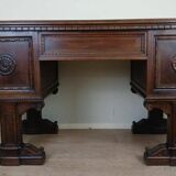 Unusual Renaissance style center desk made in the mid-19th century in walnut