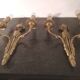 Pair of Louis XVI style sconces in gilded bronze