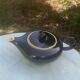 Teapot and milk jug We Two in vintage black and yellow ceramic