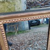 Miroir ancien en bois doré style louis xvi