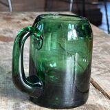 Tasse, chope en verre vert bouteille
