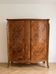 Antique Louis XV style wardrobe with floral marquetry.