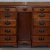 Small Victorian desk in solid walnut with drawers.