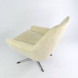 Cream corduroy swivel shell armchairs