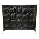 Black metal firewall decorated with animals