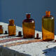 4 old apothecary bottles / amber glass pharmacy in perfect condition dated before 1960