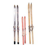 3 pairs of old skis