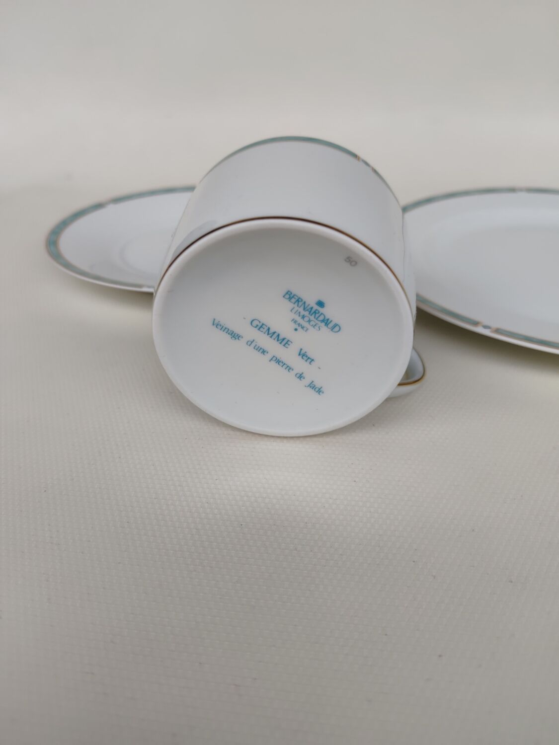 Three-piece Limoges porcelain set. By Bernardaud.