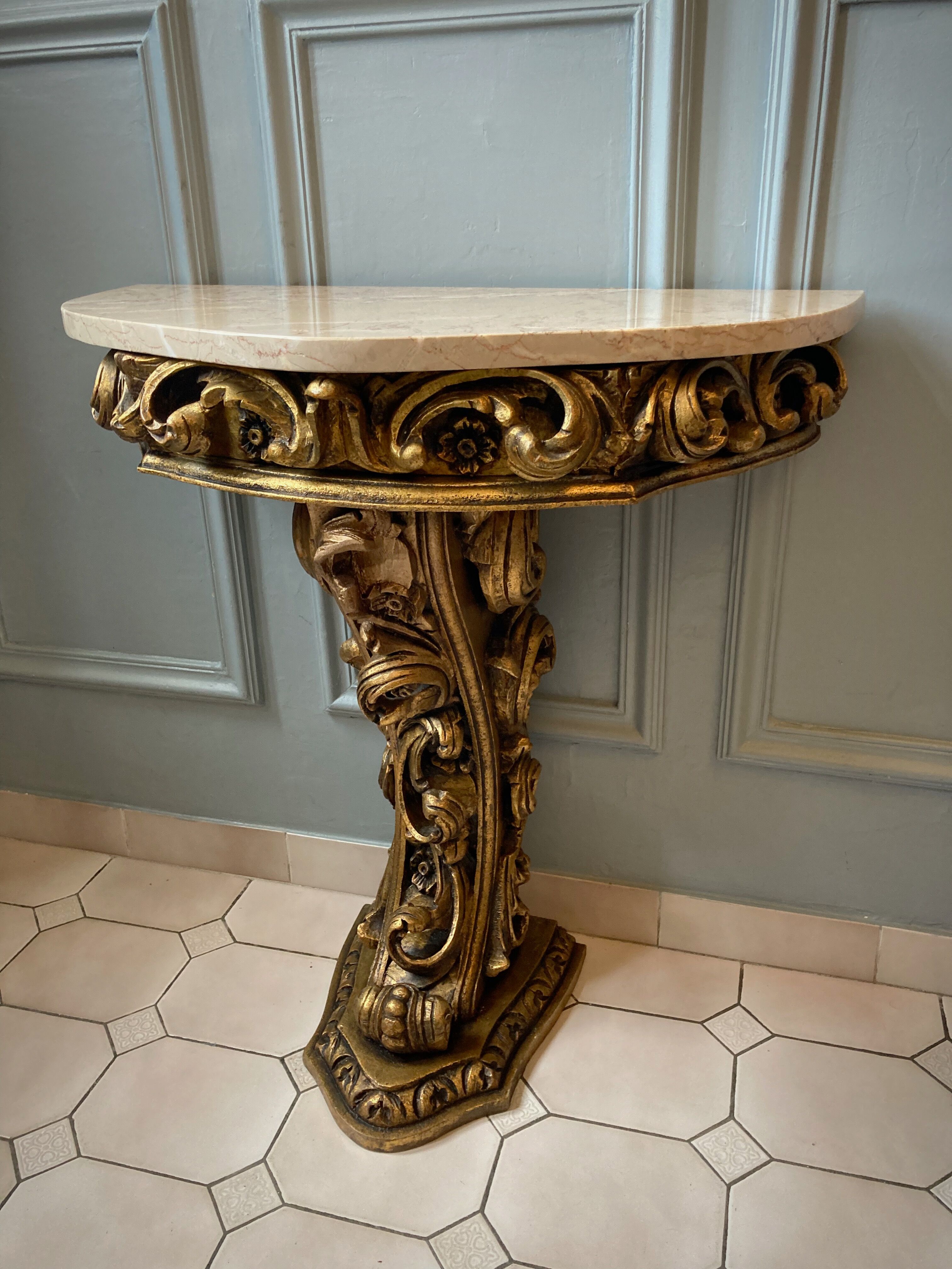 Carved wooden and marble console
