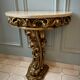 Carved wooden and marble console
