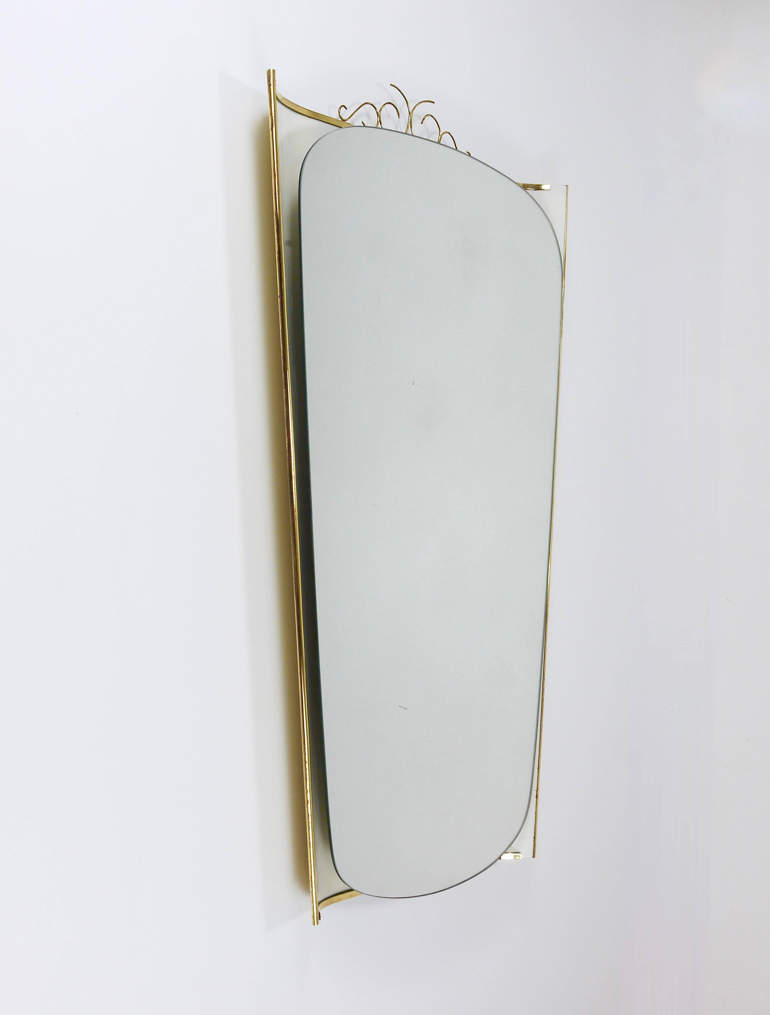 Mid-century illuminated wall mirror by Ernest Igl with brass crown, by Hillebrand.