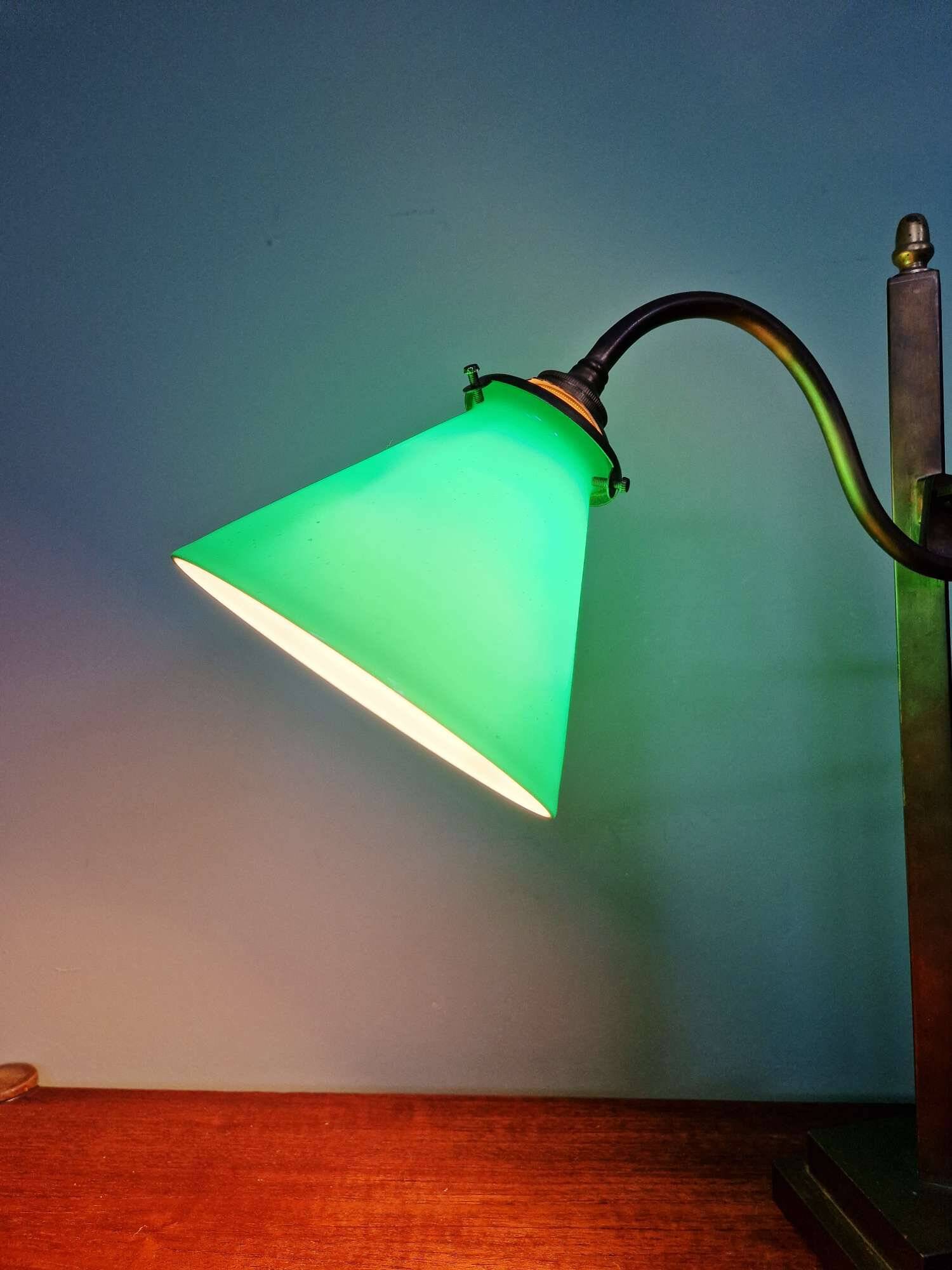 Bronze desk lamp with a green opaline conical shade, 1920.