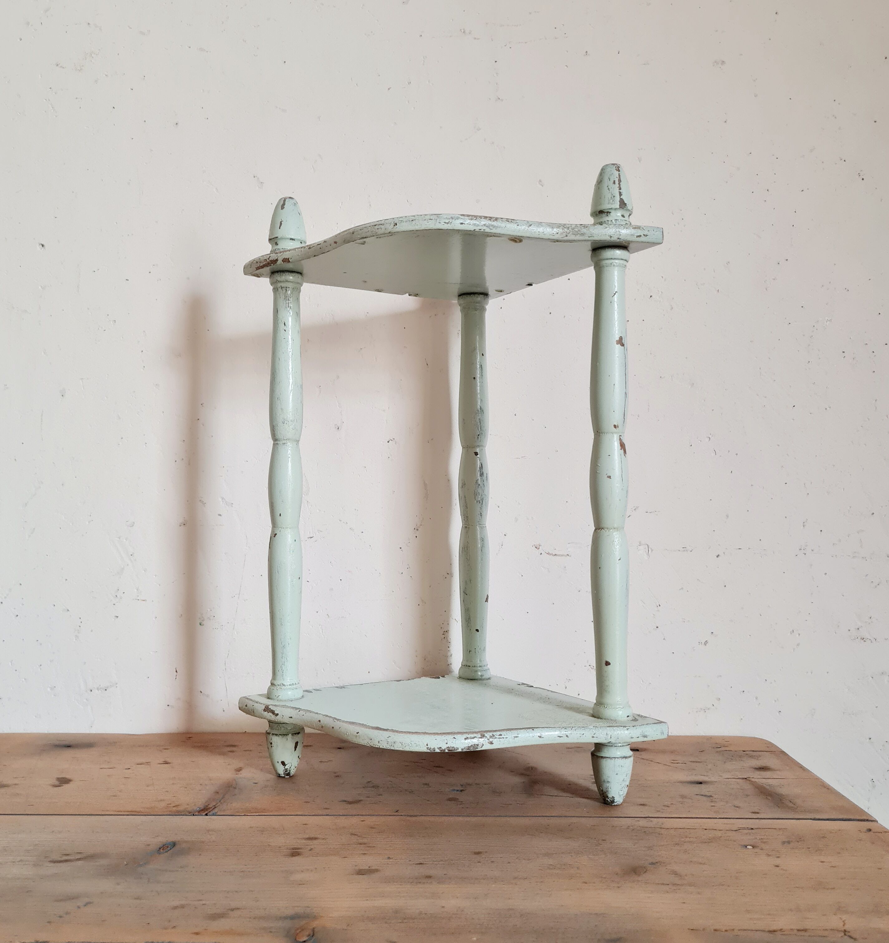Old green patinated wooden shelf