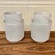 SET OF 2 LARGE METAL CANDLE HOLDERS IN SCANDINAVIAN DESIGN.