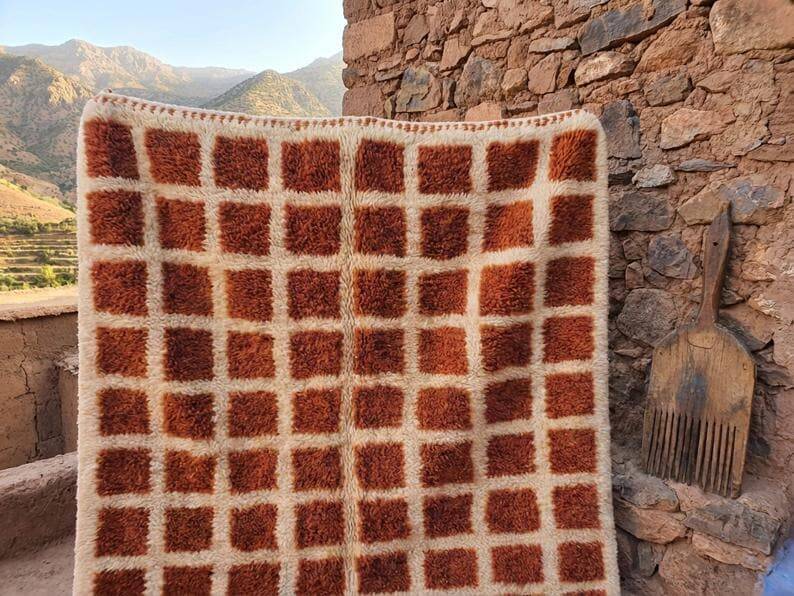 Ecru Moroccan rug with geometric patterns 200cm x 270cm.