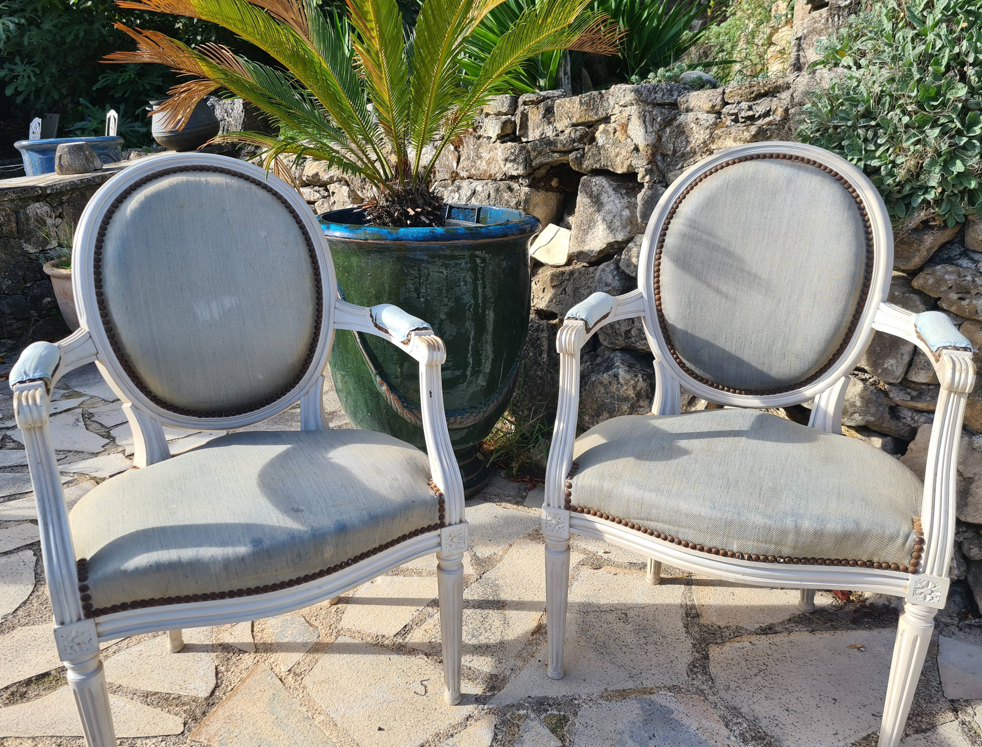 Pair of Louis XVI style medallion armchairs lacquered white