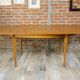 Wooden oval table and 6 matching chairs 60