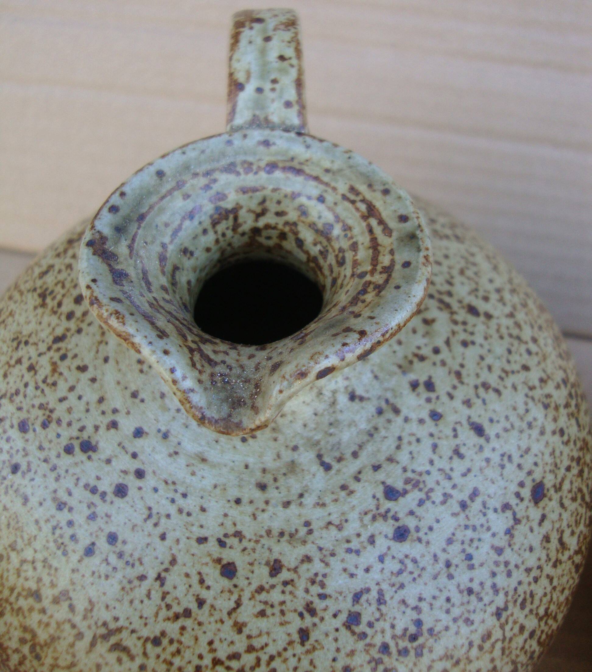 Pair of small antique stoneware oil jars