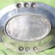 Service tray made of cast aluminium with vegetable decoration