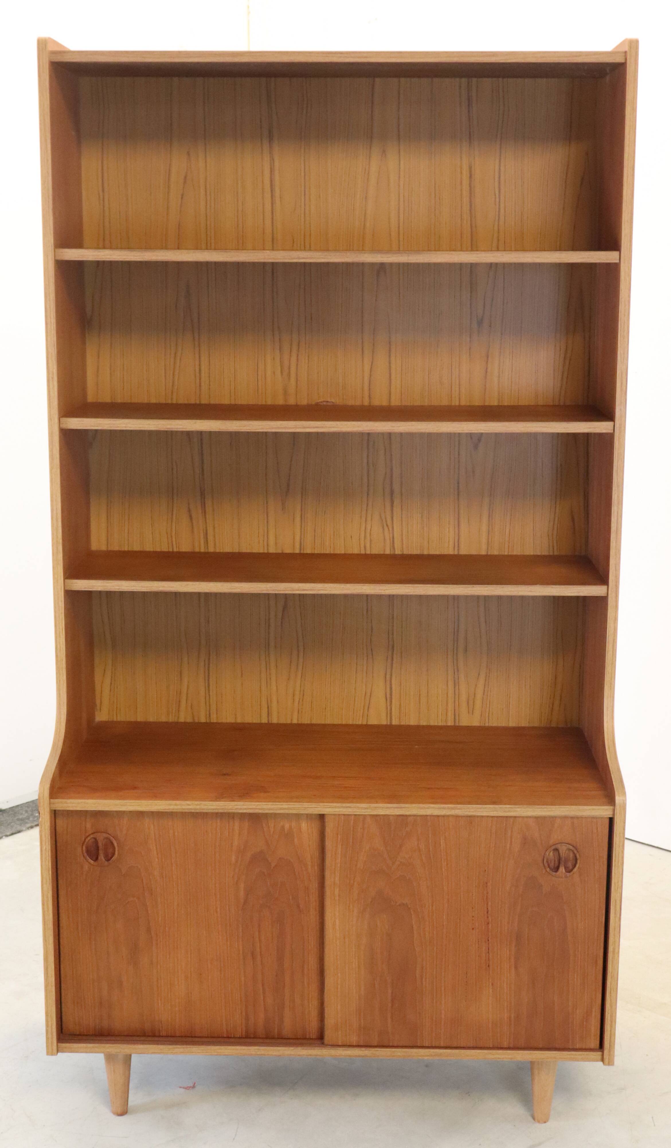 vintage bookcase with full on storage space.