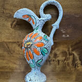 Curious ceramic pitcher