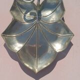 Gilded brass leaf pocket emptier