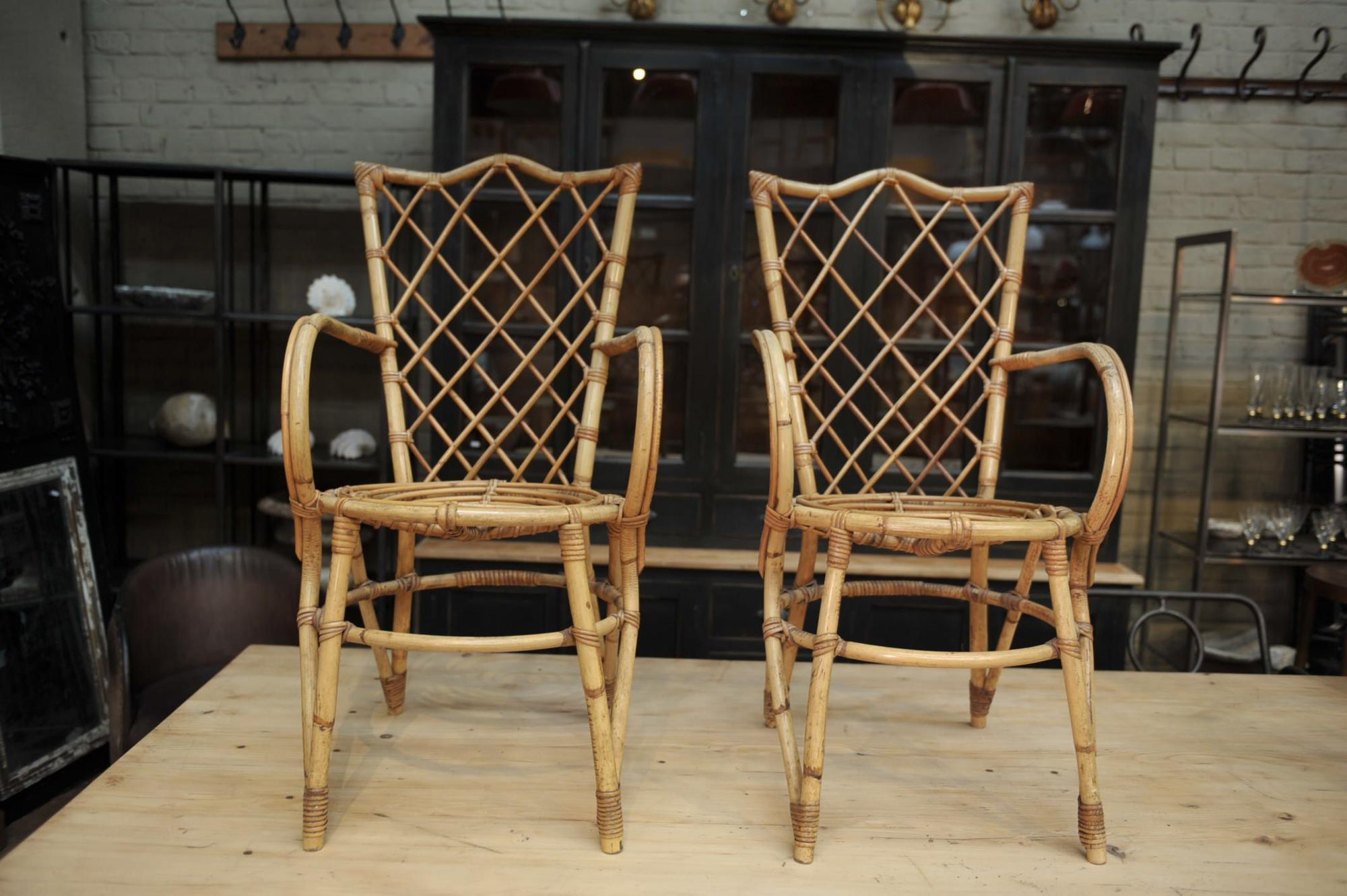 Pair of chairs in rattan 1960 by Louis Sognot