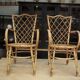 Pair of chairs in rattan 1960 by Louis Sognot