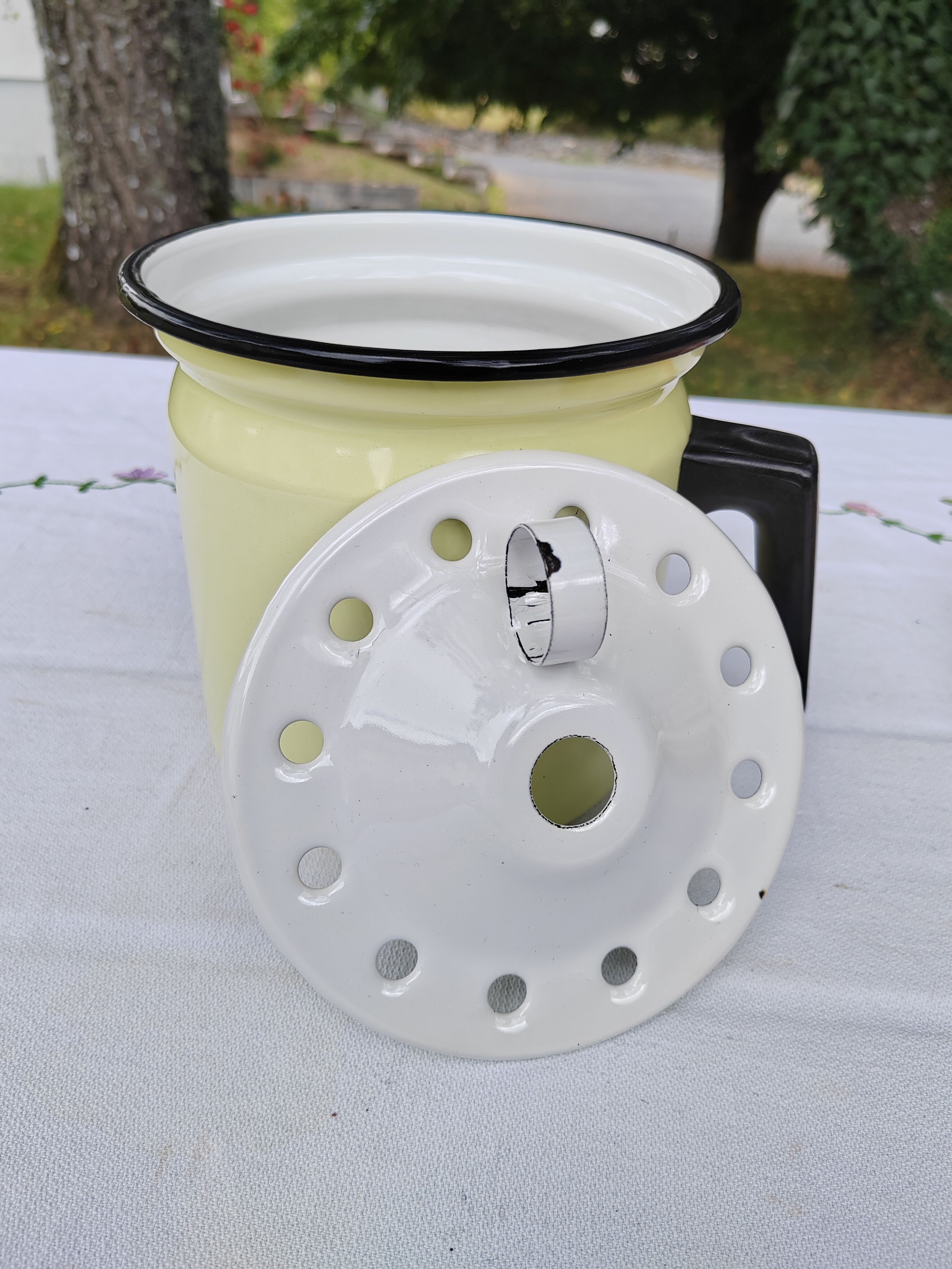 Yellow enamelled milk kettle