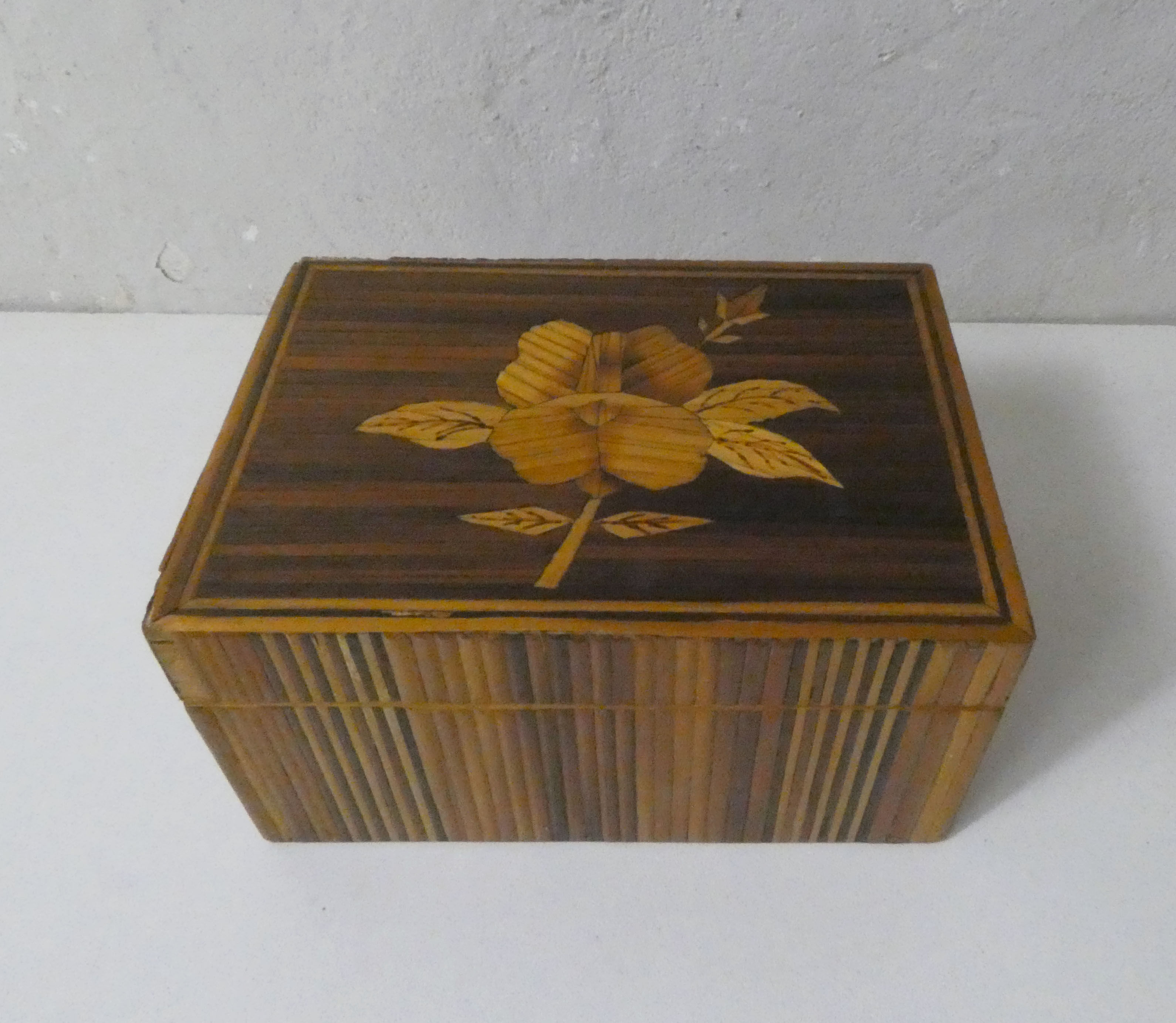 Old trundle boxes in straw marquetry