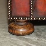 Pair of restored antique Chesterfield sofas in Boudreaux leather.