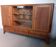 Display buffet in cherry veneer and natural wood.
