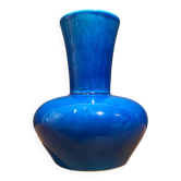 Signed vase in turquoise blue earthenware