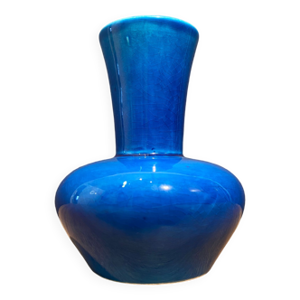 Signed vase in turquoise blue earthenware