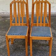 4 solid wood and blue fabric dining chairs with bars