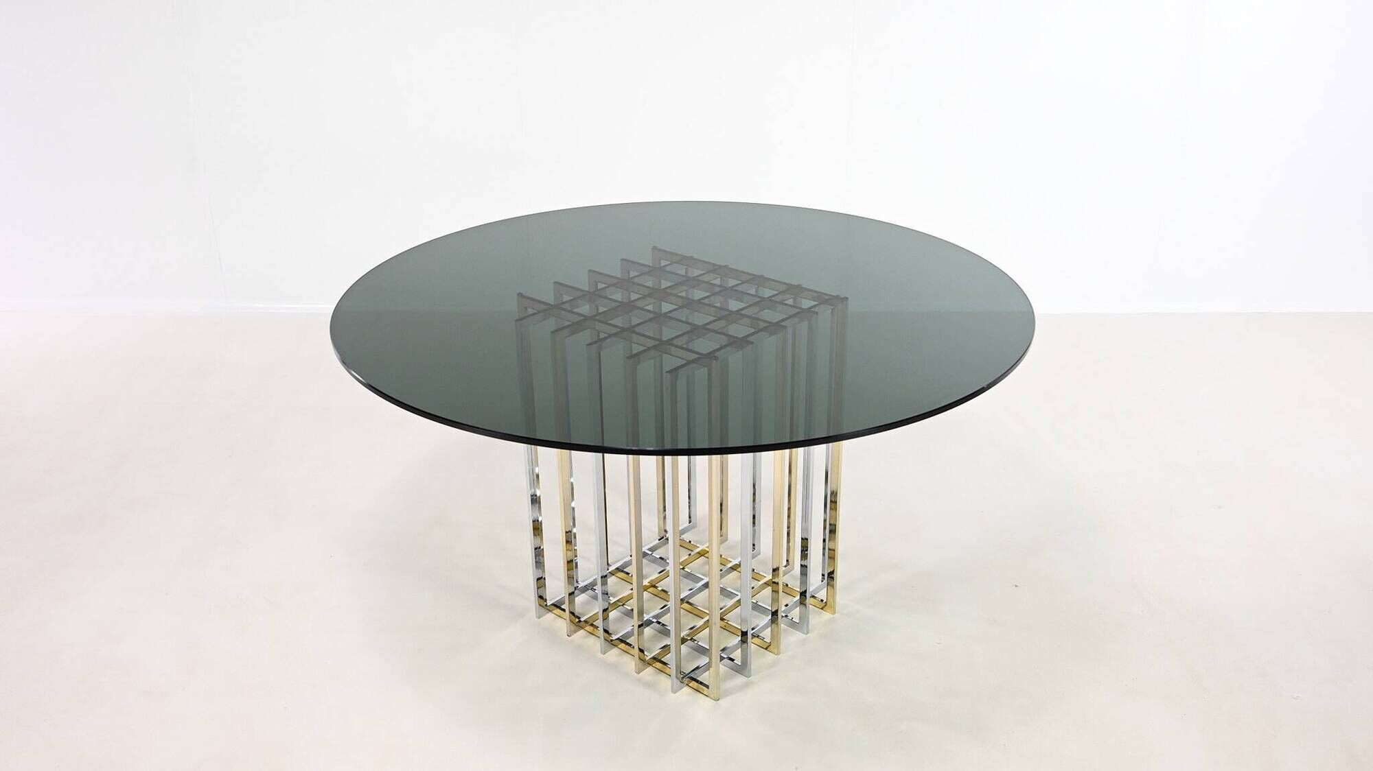 Pierre cardin, “cage” dining table, chrome and gilded steel. france, circa 1970.