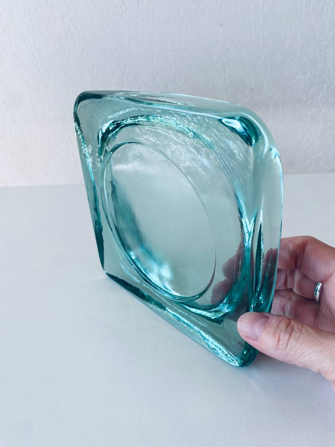 Glass tiled pocket emptier