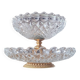 Two-tier display stand in cut glass mounted on a gold metal base.