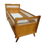 Vintage baby bed in rattan