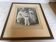 Large frame old photograph of a trio of communicants.