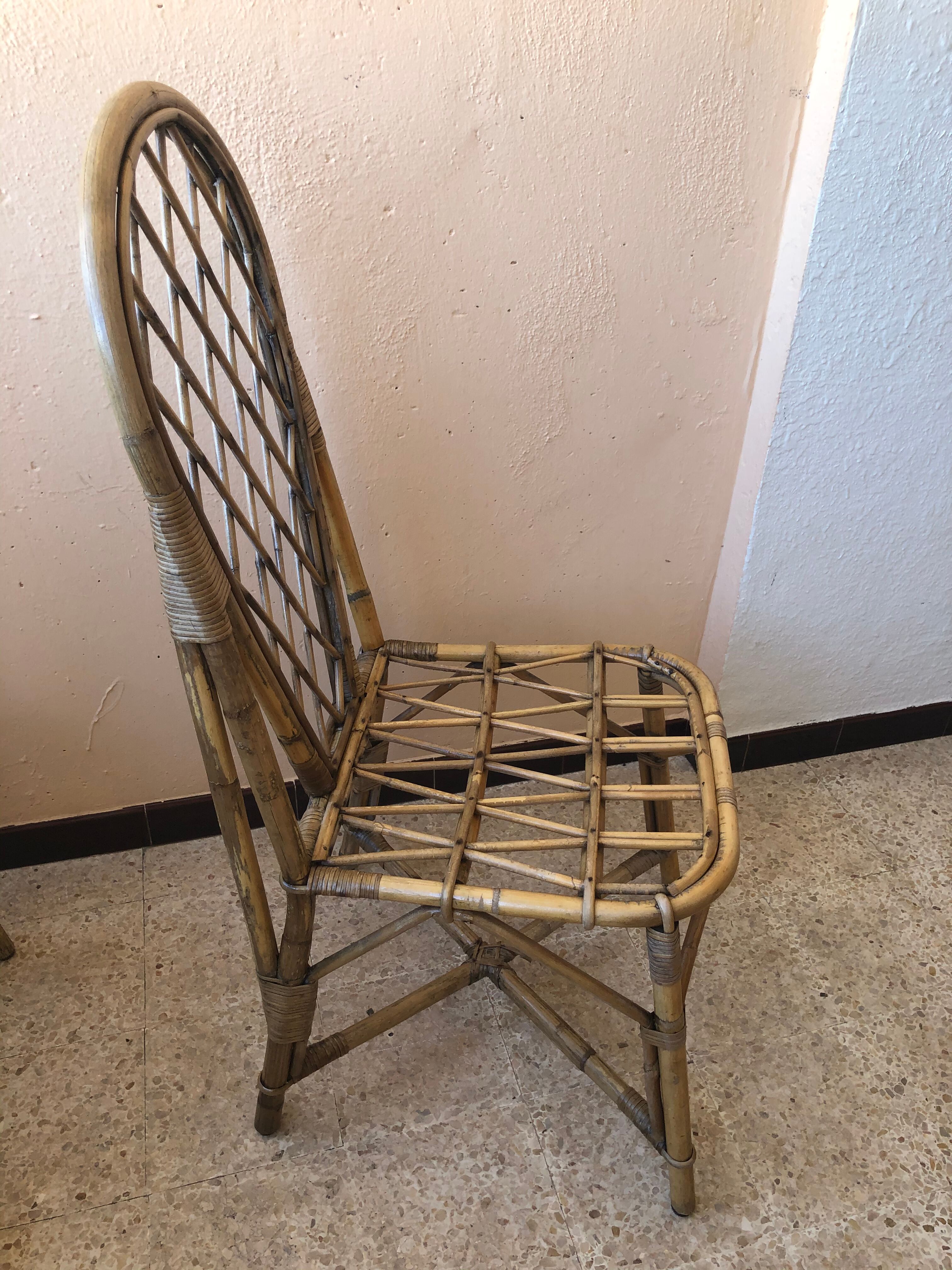 Series of 4 vintage rattan chairs