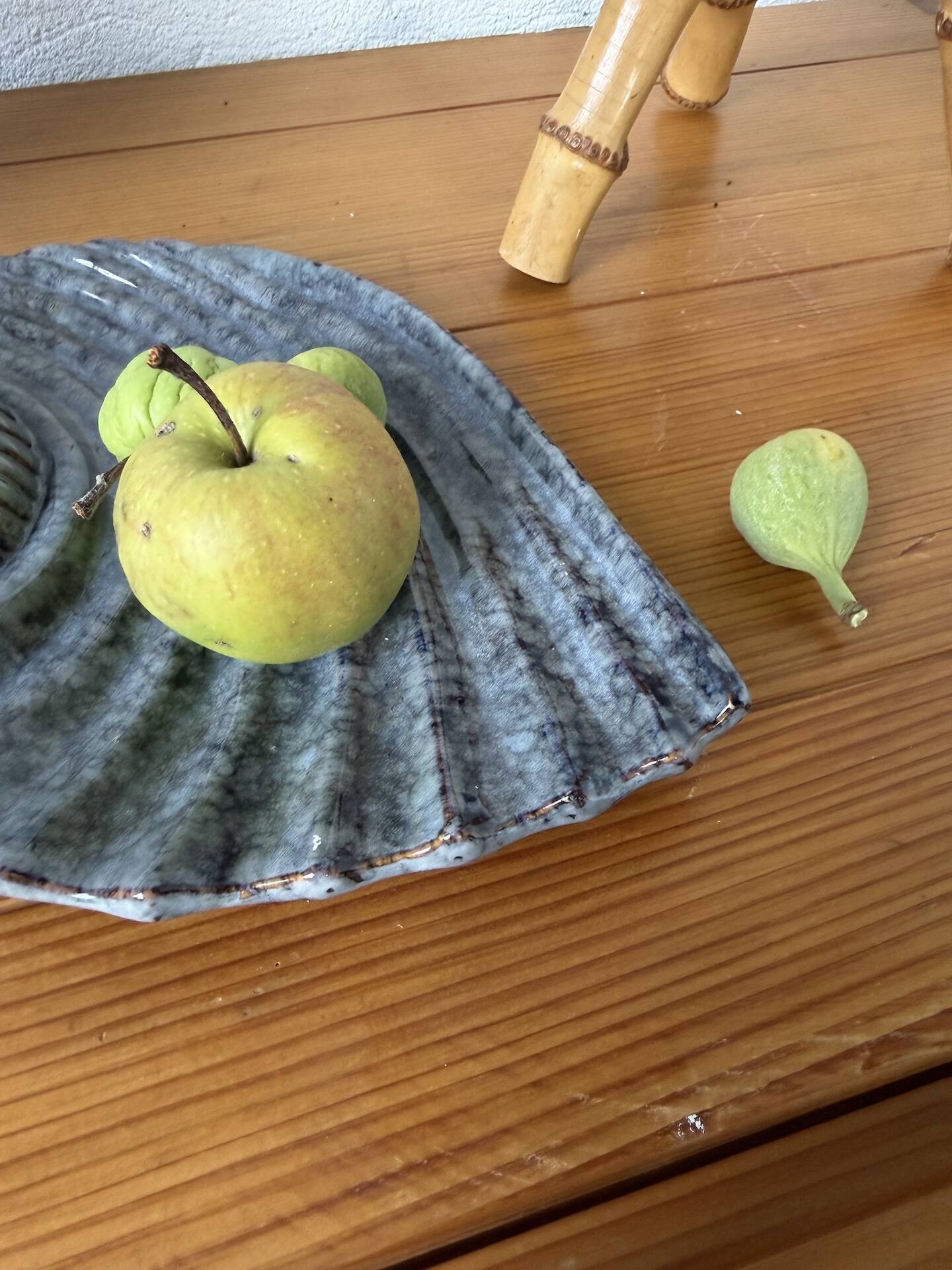 Shell-shaped ceramic catchall.