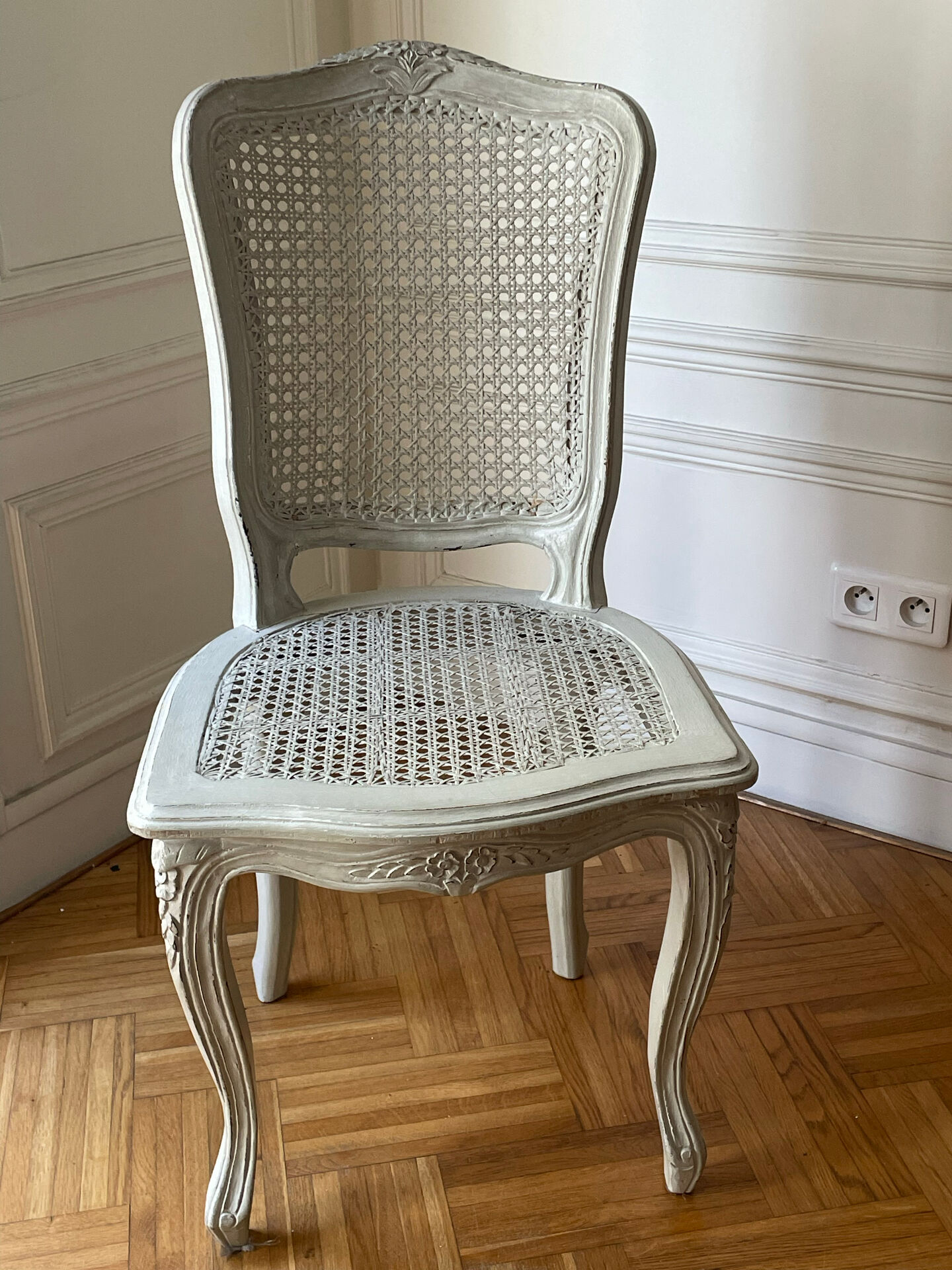 Set of 4 white caned chairs in Louis XV style.