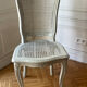 Set of 4 white caned chairs in Louis XV style.