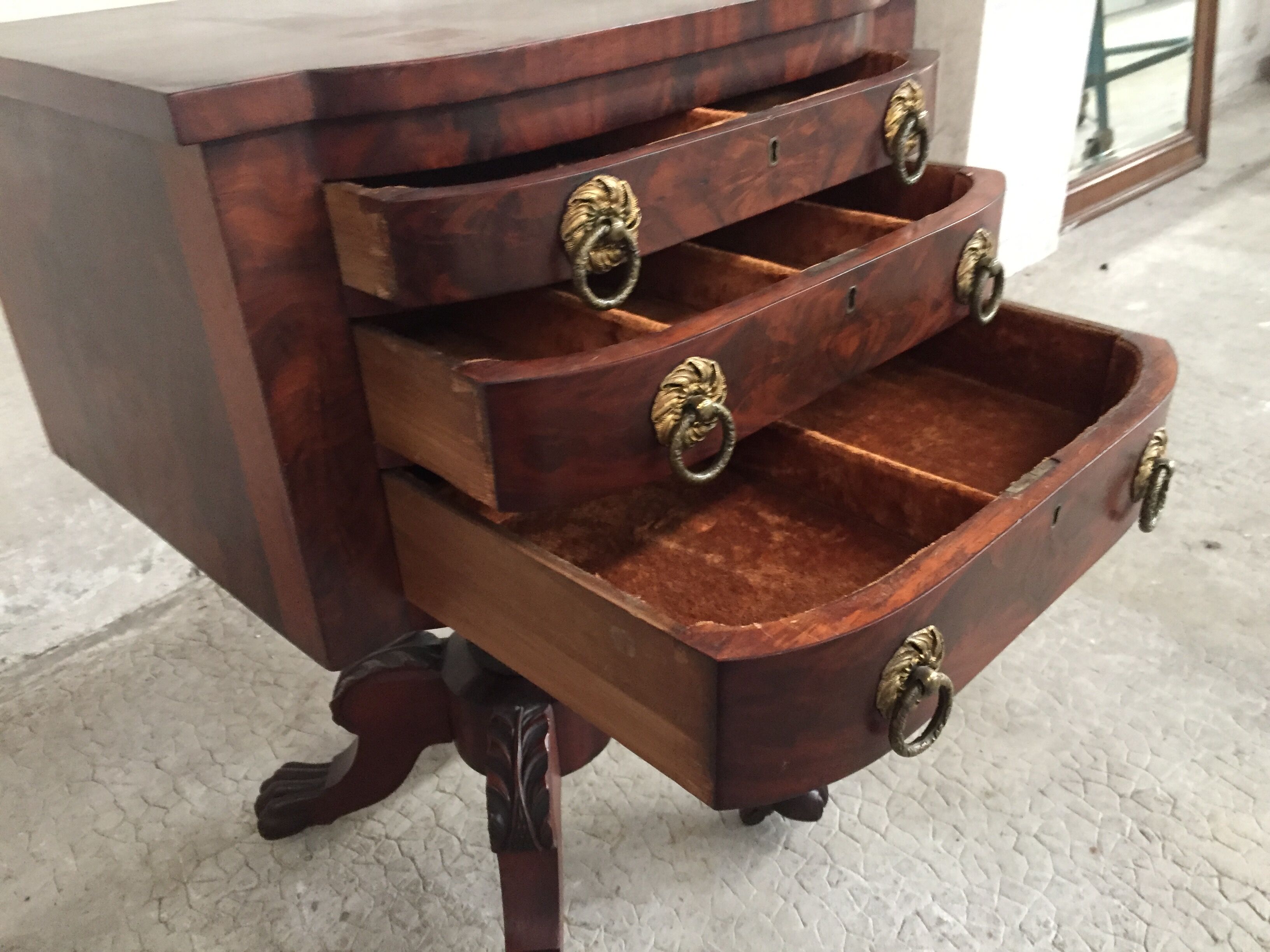Small piece of english furniture has 3 drawers in mahogany for silverware