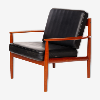 Armchair by Grete Jalk, France Son, cowhide leather and vintage teak from the 1960s