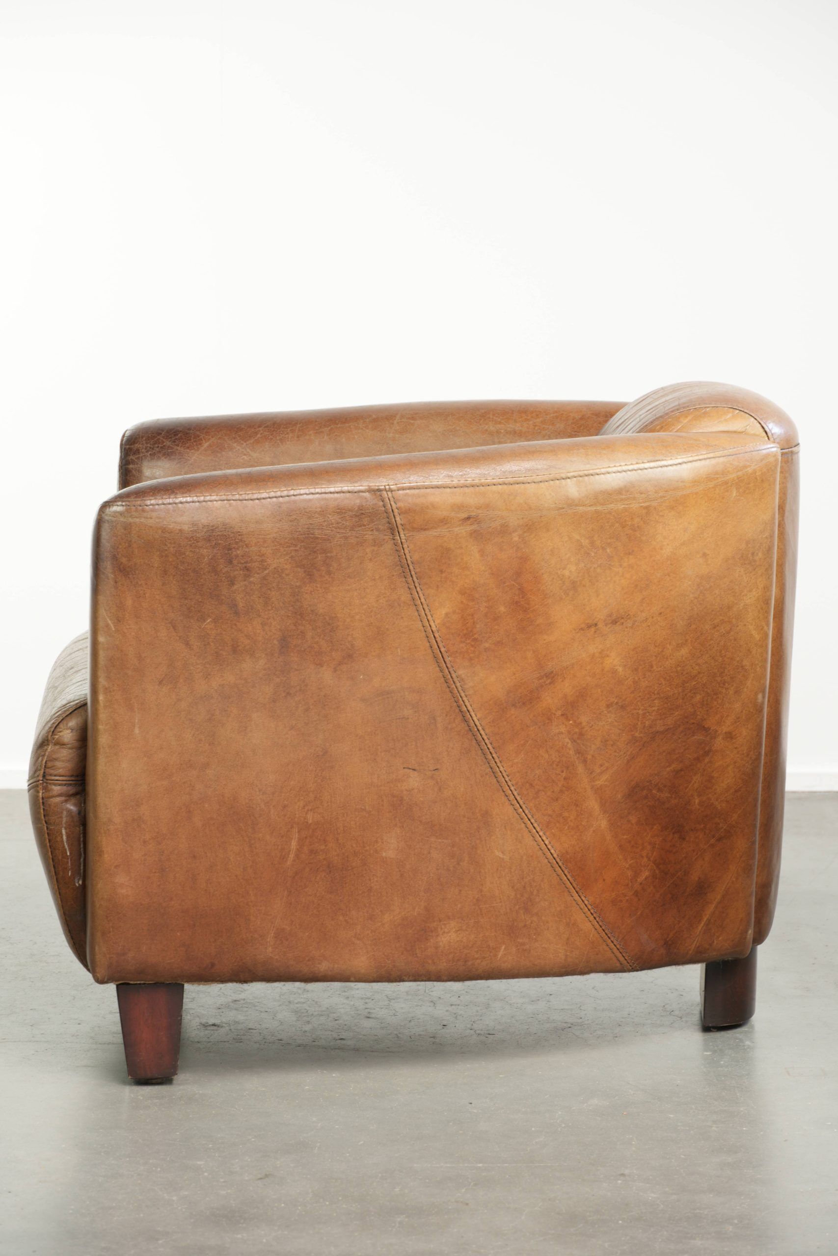 Fauteuil design aviateur en cuir de vache couleur cognac intemporelle