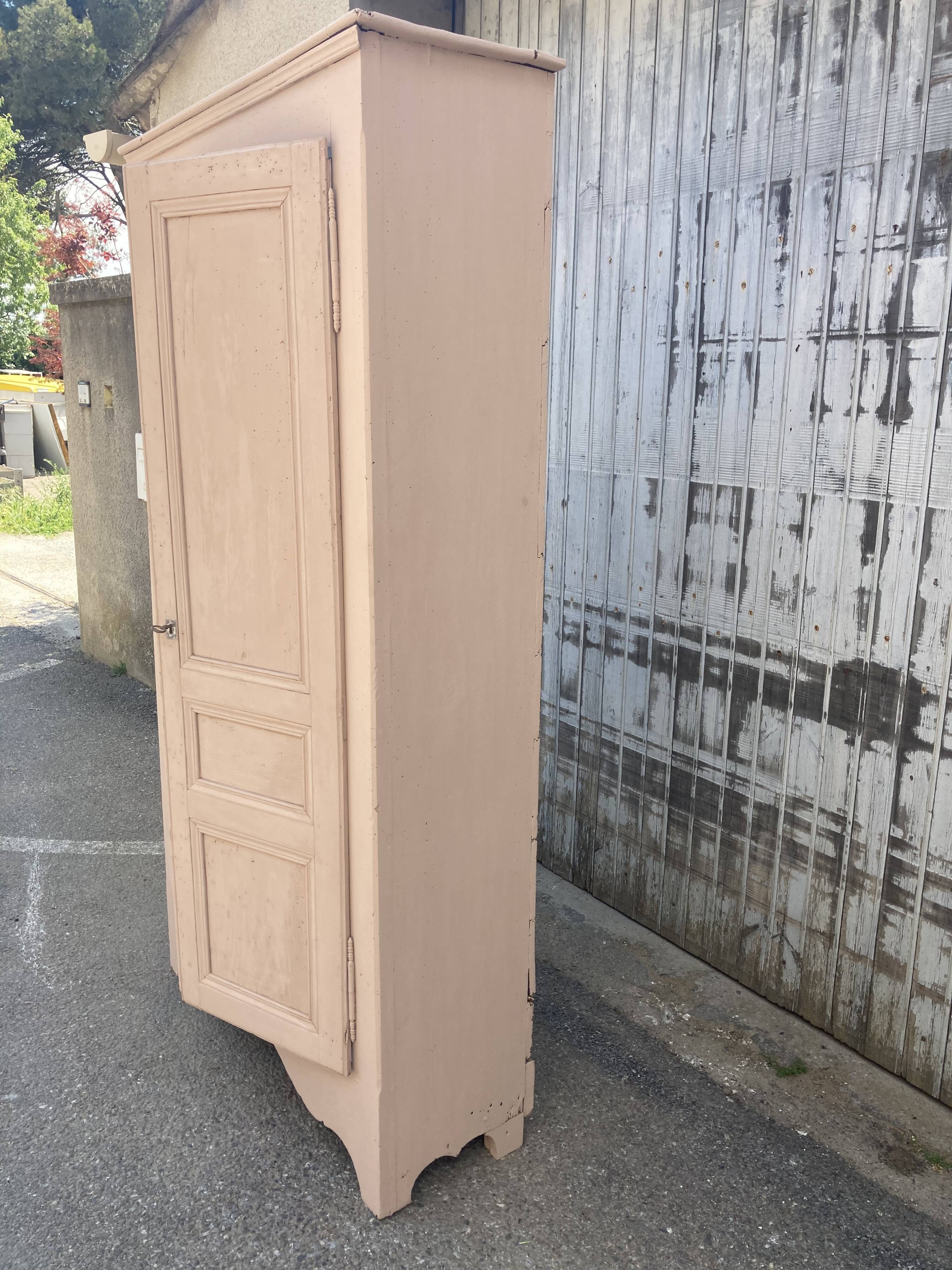 Painted cupboard made of solid wood