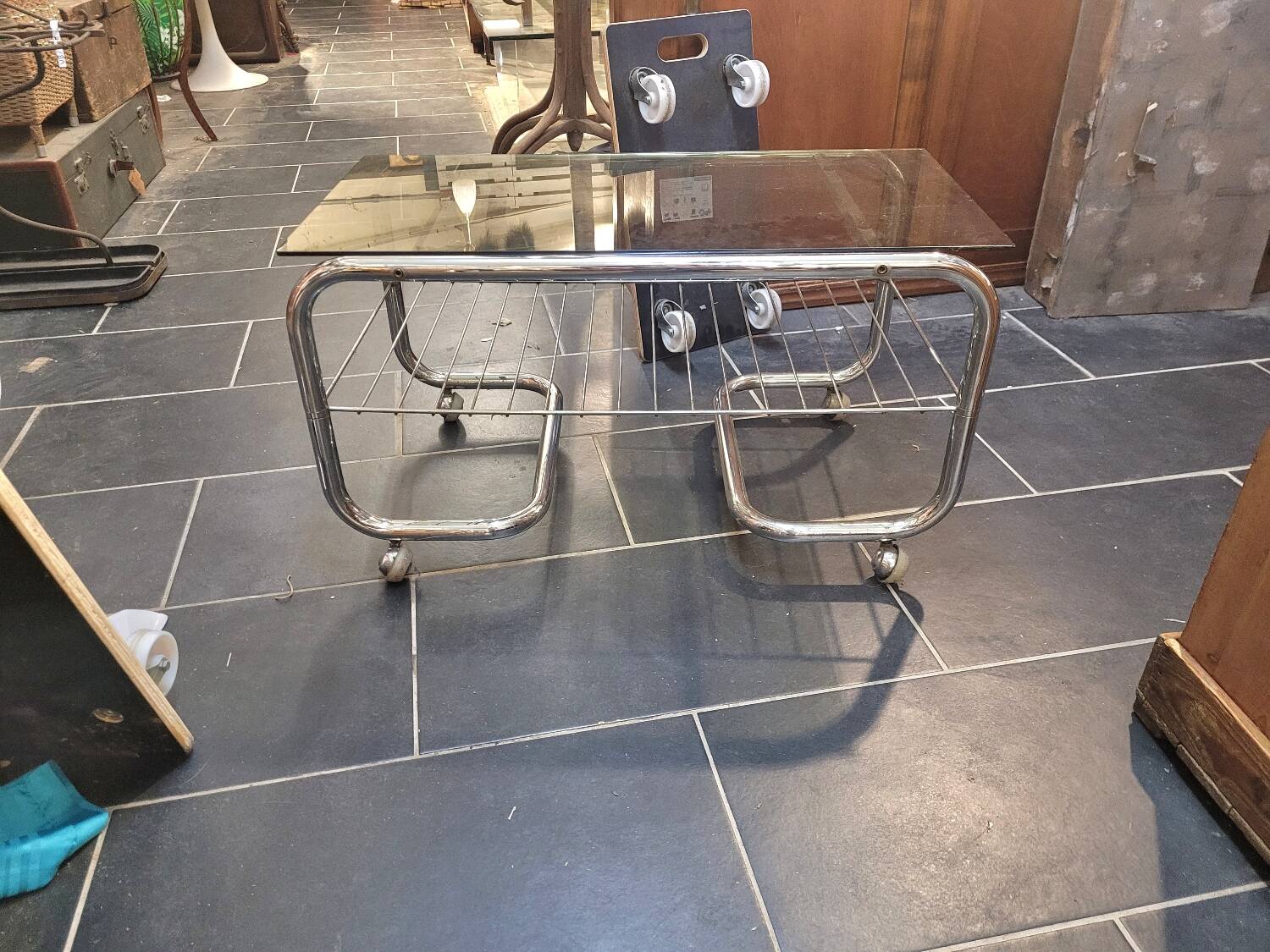 Coffee table with chrome base and smoked glass from the 70s